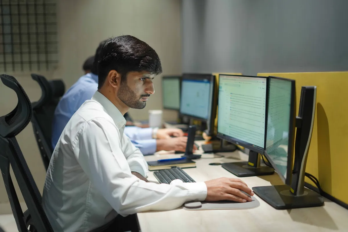 A Digital Accountant accountant working at his desk